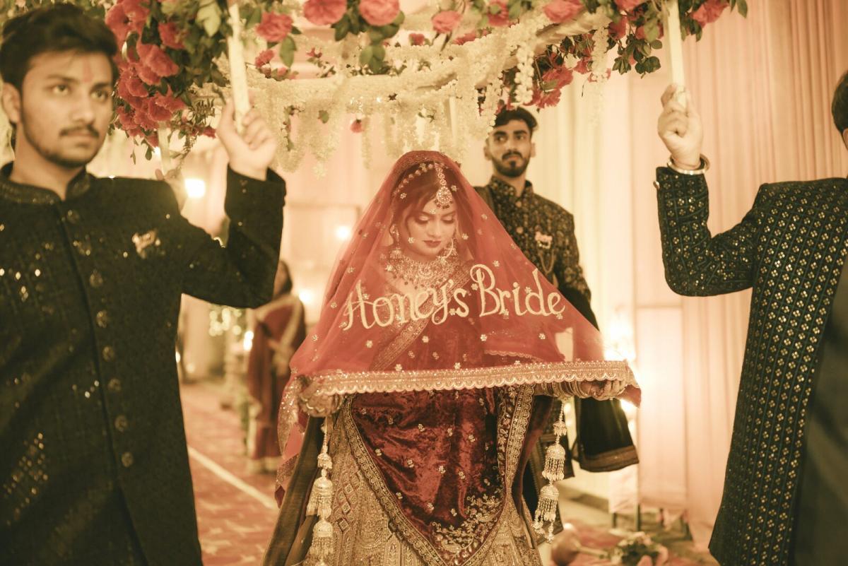 Bride arriving in a decorated doli at her wedding in Prayagraj