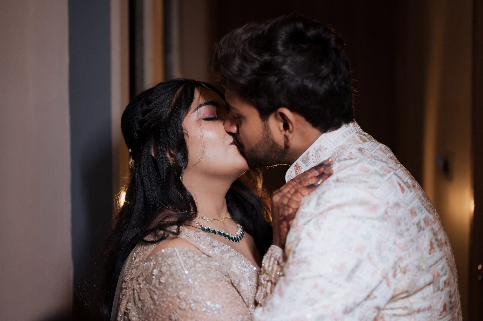 Bride and groom in a close moment on their wedding day, Prayagraj