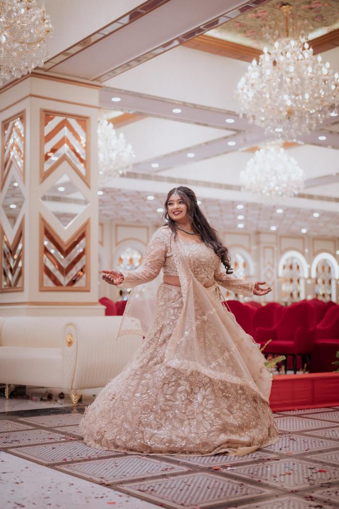 Bride twirling in the banquet hall, PickYouPic Prayagraj