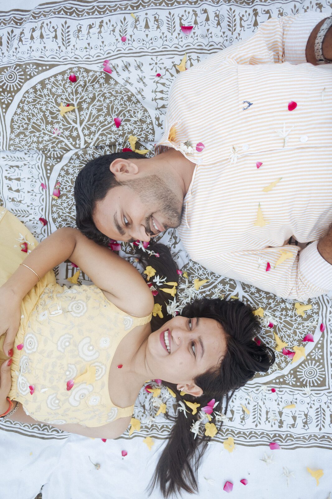 Overhead frame with flower petals, Chitrakoot pre-wedding shoot