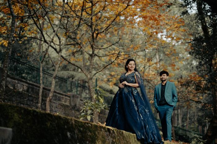Couple in the autumn woods of Nainital during their pre-wedding photoshoot
