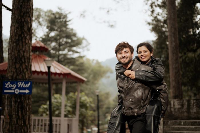 Couple outside the KMVN log huts at Sattal, Nainital, on their pre-wedding shoot