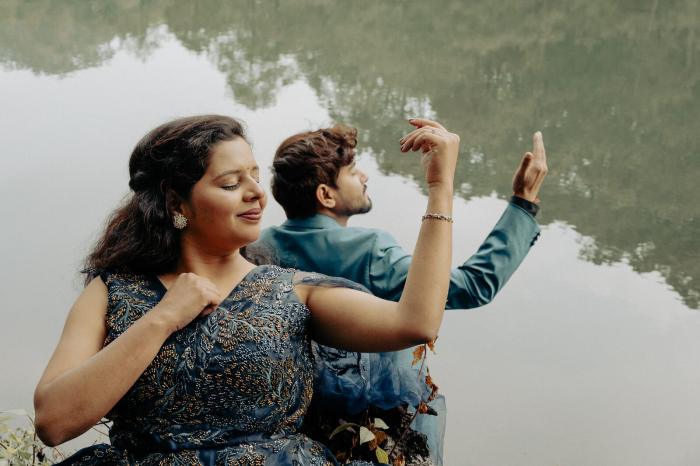 Candid pre-wedding moment by a still lake in Nainital, Uttarakhand