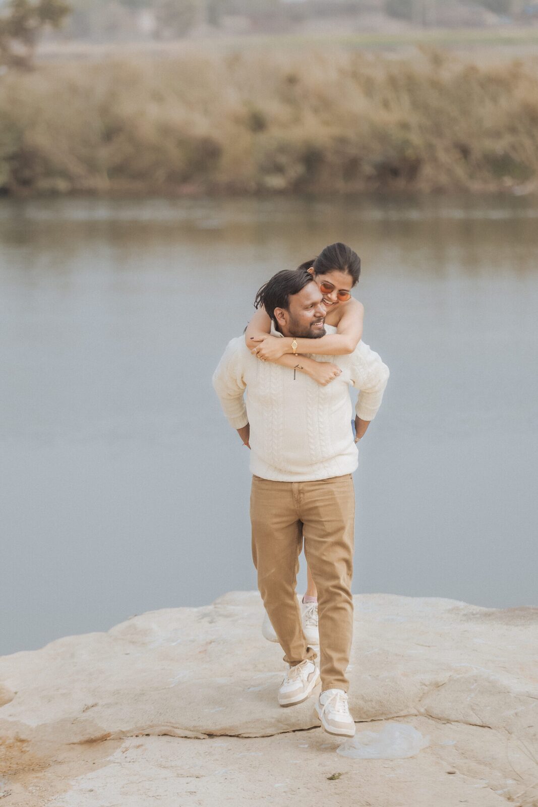 Couple on the rocks by the Yamuna near Pabhosa, Kaushambi
