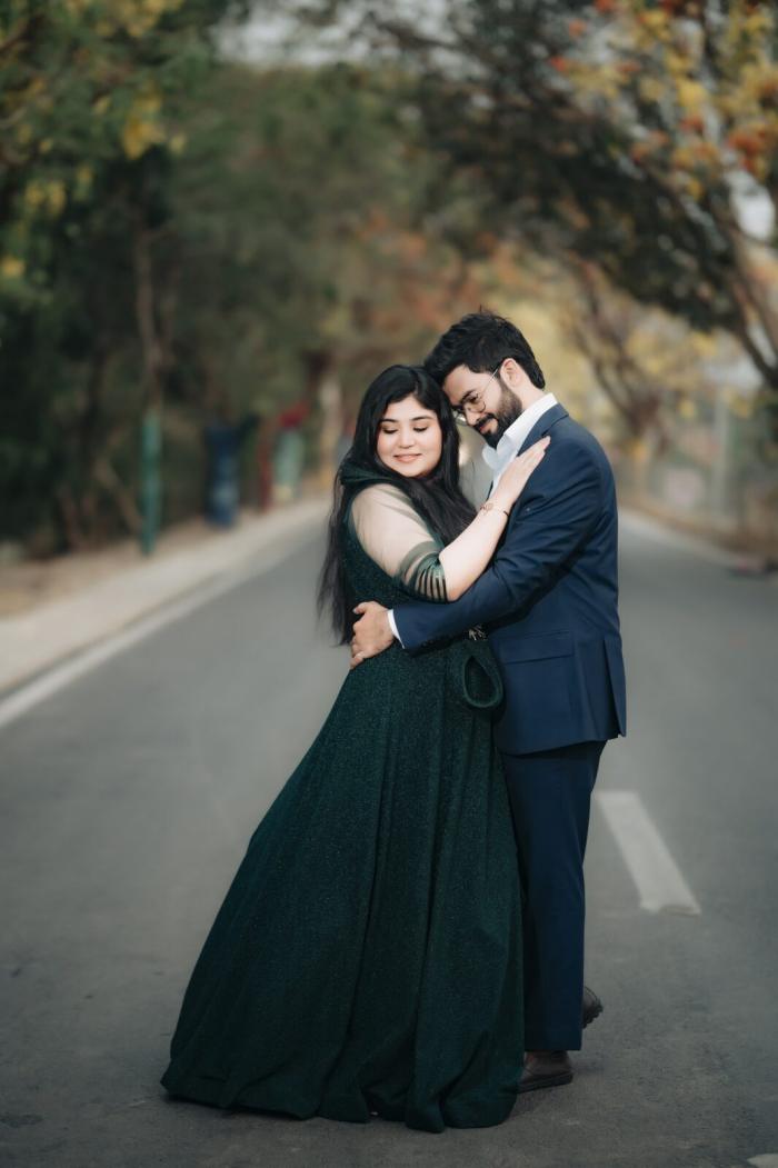 Couple embracing on a tree-lined road, pre-wedding photography by PickYouPic