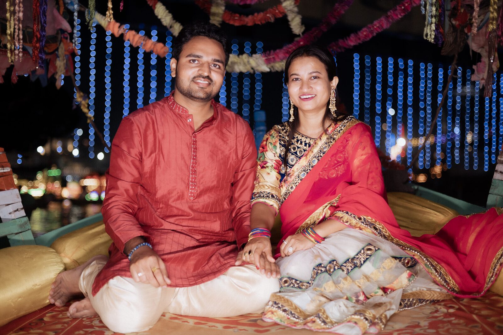 Couple seated on a decorated boat at Ram Ghat, Chitrakoot