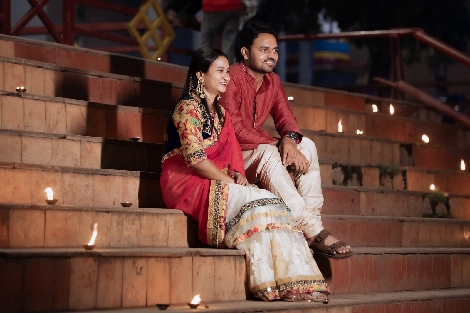 Sitting among lit diyas on the Ram Ghat steps, Chitrakoot