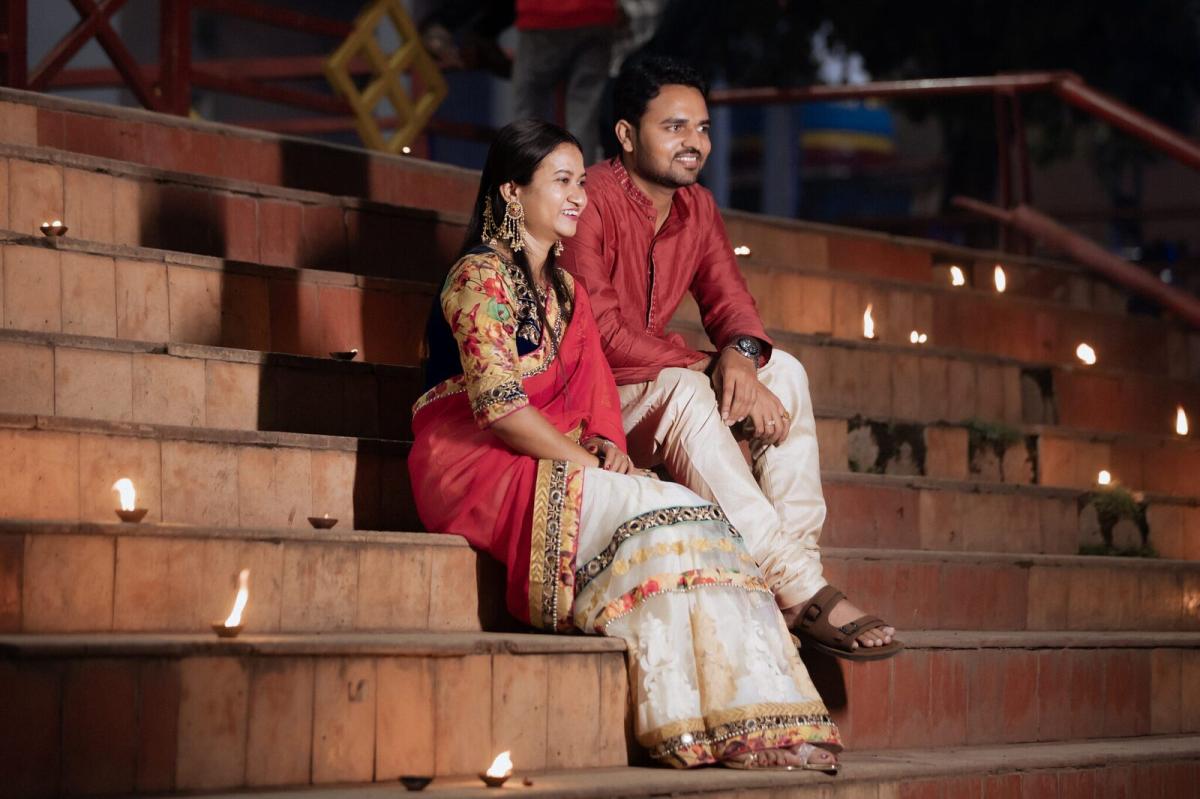 Sitting among lit diyas on the Ram Ghat steps, Chitrakoot