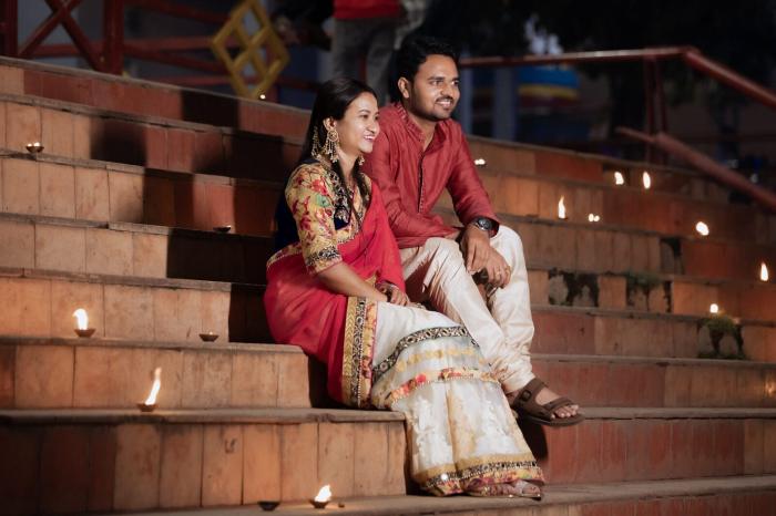 Sitting among lit diyas on the Ram Ghat steps, Chitrakoot