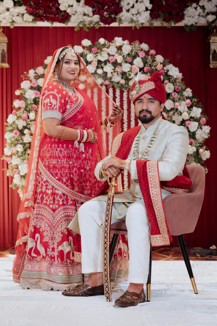 Bride and groom seated on the wedding stage, Prayagraj